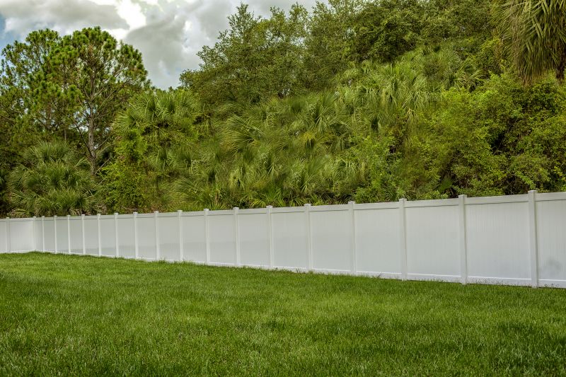 Finished White Vinyl Fence with Landscaping